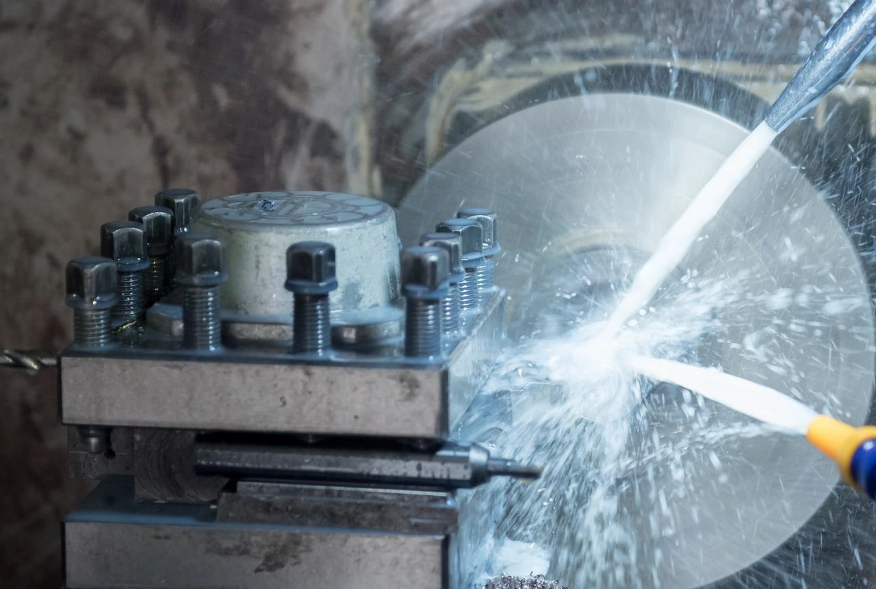 Waterjet cutting metal components in action